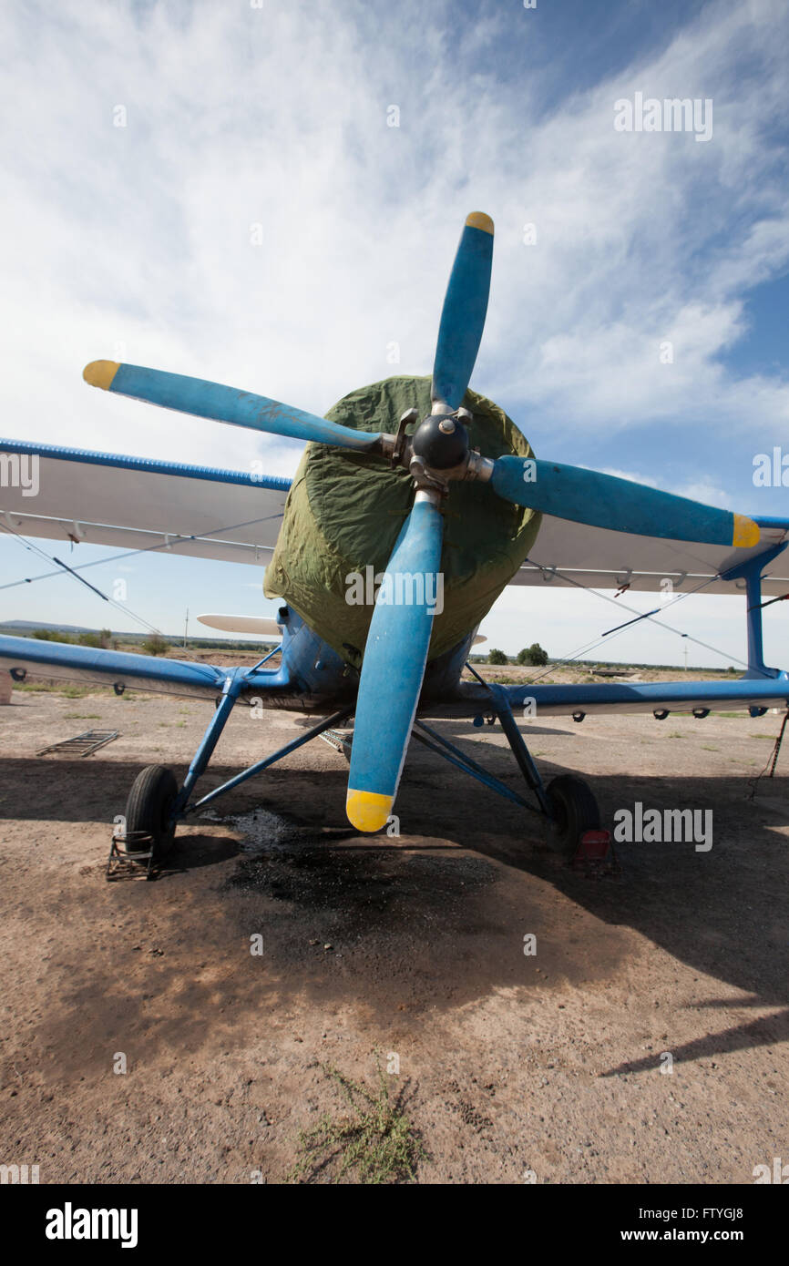 Kazakhstan, Kazakistan, Asia, landed agriculture airplane, biplane, helix. Stock Photo