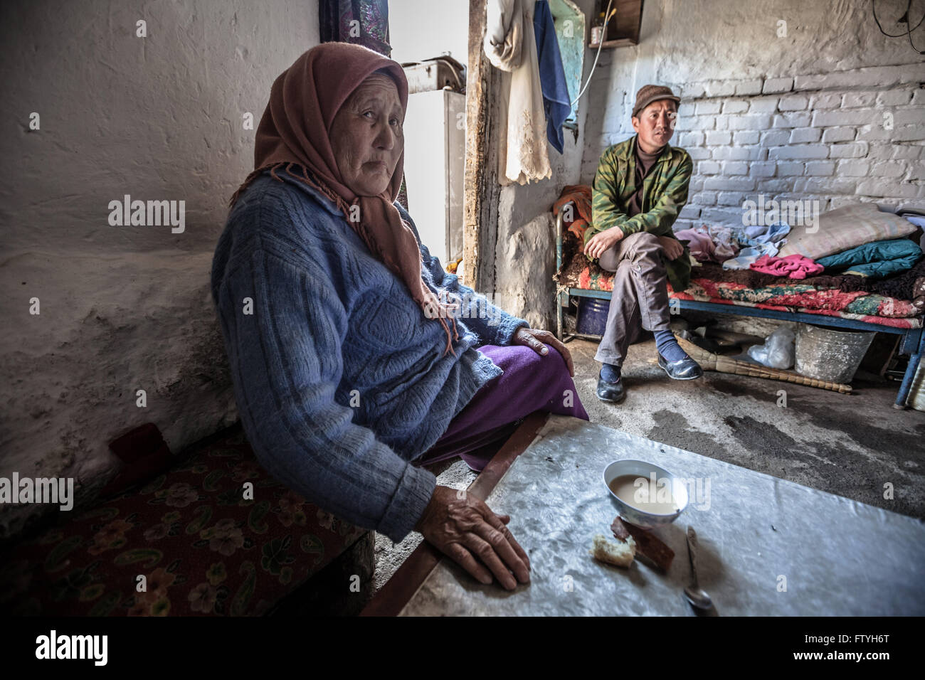 Kazakhstan, Kazakistan, father and grandmother at home. Stock Photo