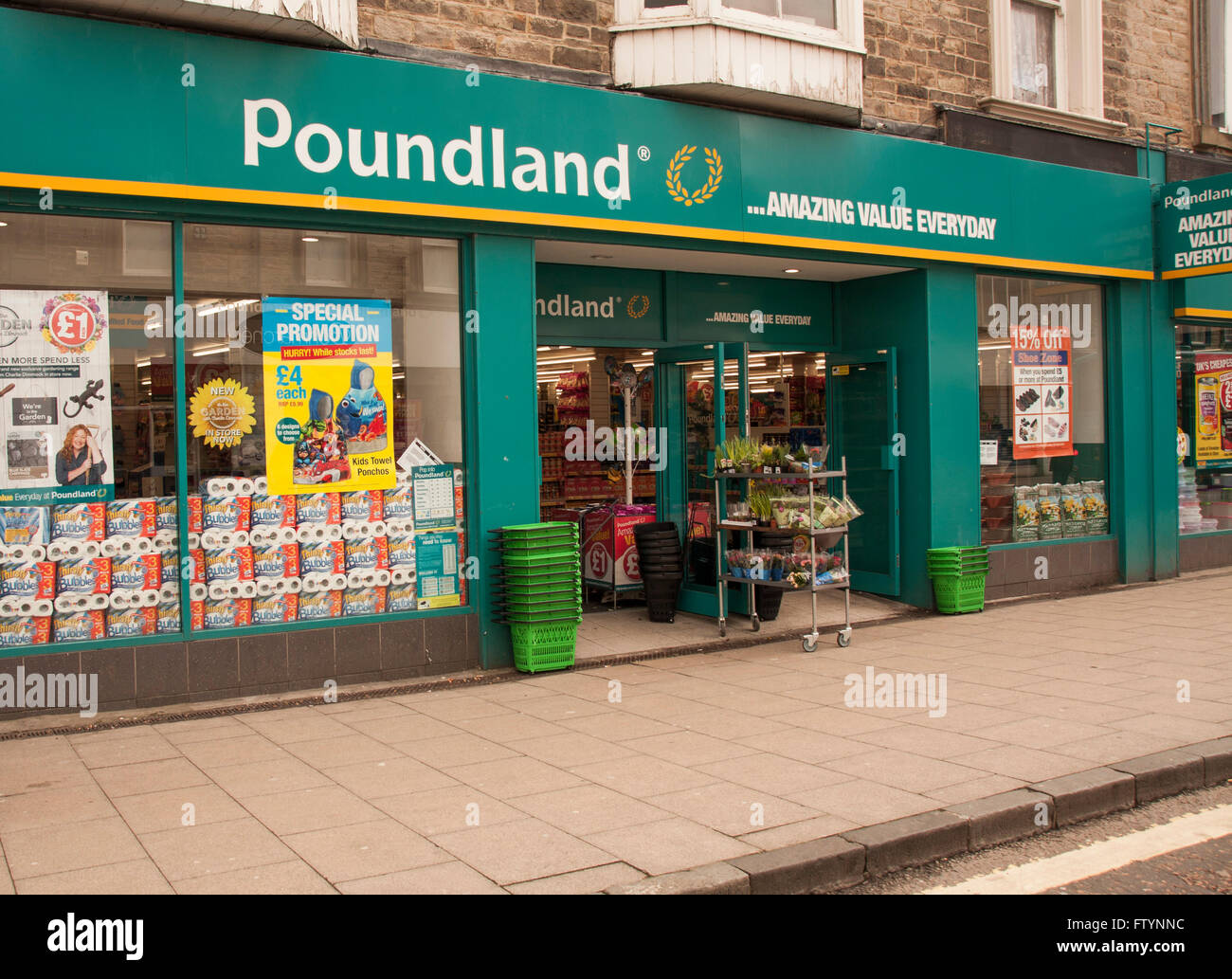 Exterior of Poundland shop in UK High Street Stock Photo