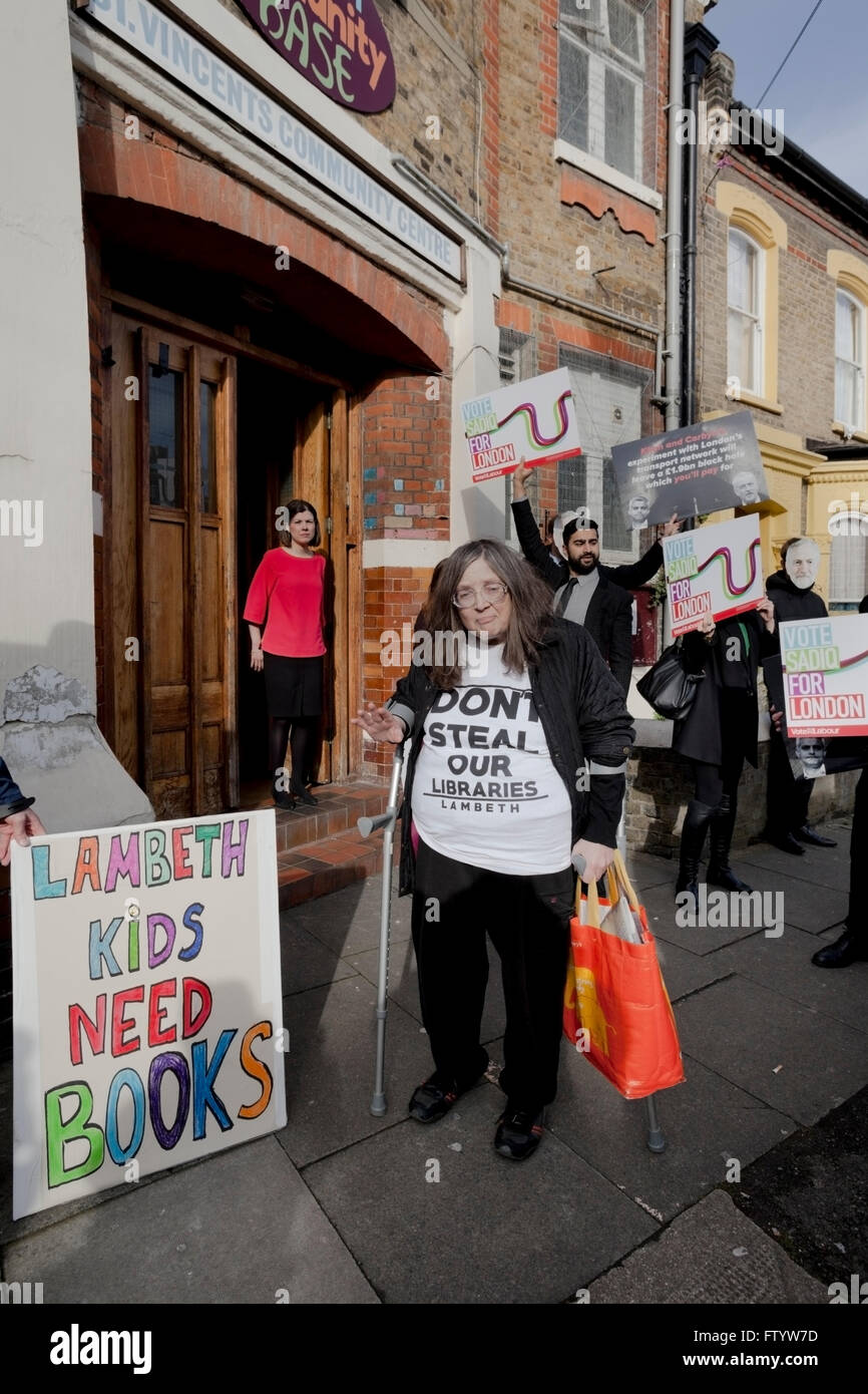 Probert Road, London UK 30th March 2016.  Protest outside an election meeting with Labour candidate Sadiq Khan.  The protestor is campaigning against Labour Lambeth Council plans to close libraries and replace them with 'bookish' gyms. Credit:  Honey Salvadori/Alamy Live News Stock Photo