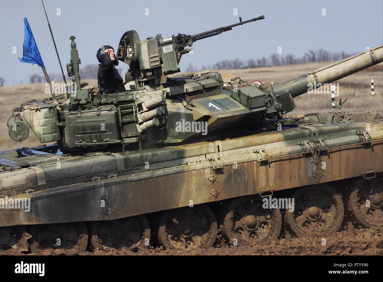 Volgograd Region Russia March 30 16 A T 72b3 Tank Crew Member During A Regional Stage Of The 16 Tank Biathlon Competition At Prudboi Firing Range As Part Of The Preparations For The