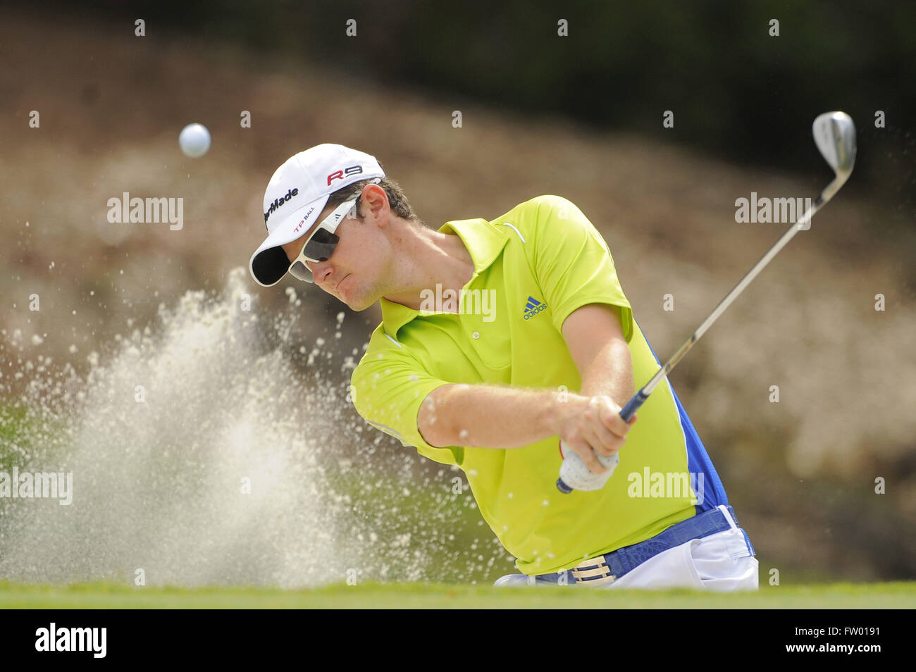 Ponte Vedra Beach, Florida, UNITED STATES. 6th May, 2009. Justin Rose hits from a green-side bunker on the 14th hole during a practice round at TPC Sawgrass on May 6, 2009 in Ponte Vedra Beach, Florida. ZUMA Press/Scott A. Miller © Scott A. Miller/ZUMA Wire/Alamy Live News Stock Photo