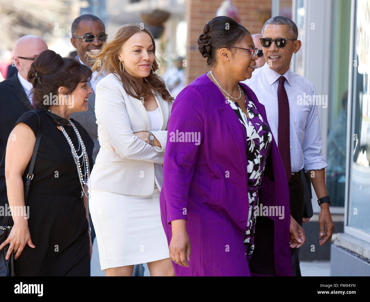 Washington DC, USA. 31th March, 2016. United States President Barack Obama walks with former inmates as he arrives to a roundtable event with formerly incarcerated individuals who have received commutations, in Washington, DC on March 30, 2016. Credit:  dpa picture alliance/Alamy Live News Stock Photo