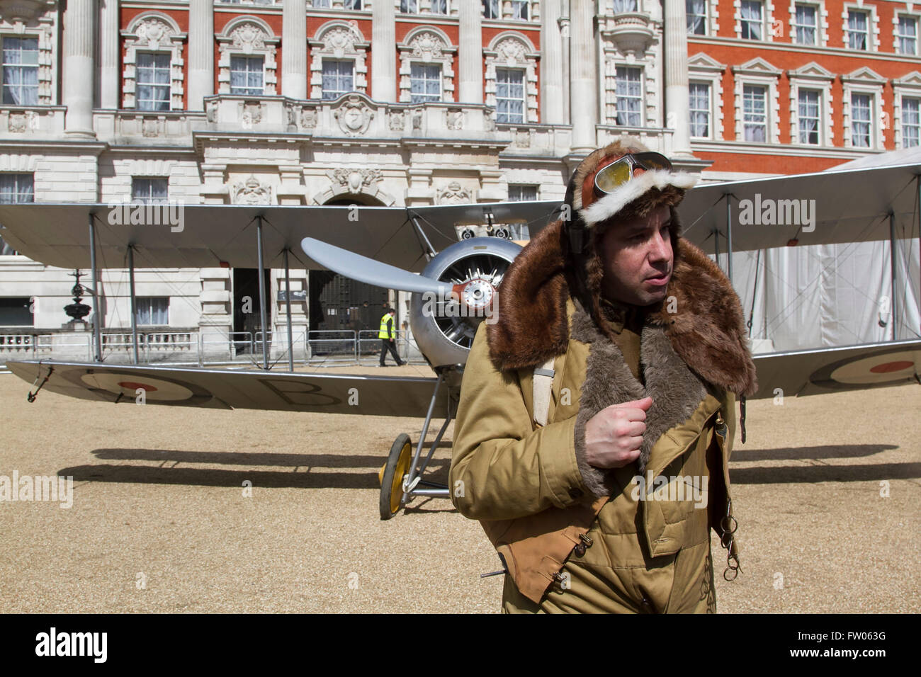 London,UK. 31st March 2016.  Dressed in a period flying suit, Vernon Creek of the Royal Air Force Museum poses with a 1918 Sopwith Snipe. The RAF Museum displays aircraft from WW1 and WW2 as well as a replica of a modern day Eurofighter Typhoon on Horse Guards Parade, to mark the RAF centenary of the creation of the Royal Airforce in 2018 Credit:  amer ghazzal/Alamy Live News Stock Photo