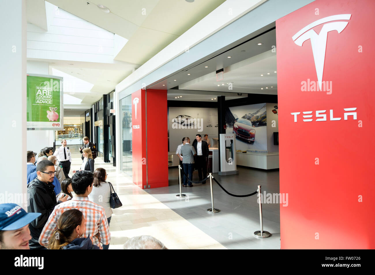 California, USA. 31st Mar, 2016. Automotive history is being made around the world today as customers line up at Tesla Motors stores and galleries to reserve a car they haven't seen yet. The Tesla Model 3 is unveiled at 8.30pm PDT on March 31st in California, USA. Credit:  Thomas Bland/Alamy Live News Stock Photo