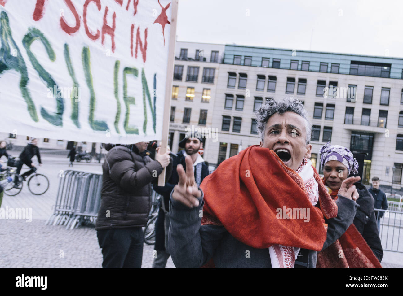 Berlin, Berlin, Germany. 31st Mar, 2016. Berlin based DJ GRACE KELLY yelling out during a spontaneous gathering of the Brazilian community of Berlin in front of Brandenburg Gate. The sympathizers of DILMA ROUSSEFF want to draw attention to the current, controversial political situation in Brazil. In the middle a deep recession, the political crisis has worsened recently in Brazil. © Jan Scheunert/ZUMA Wire/Alamy Live News Stock Photo