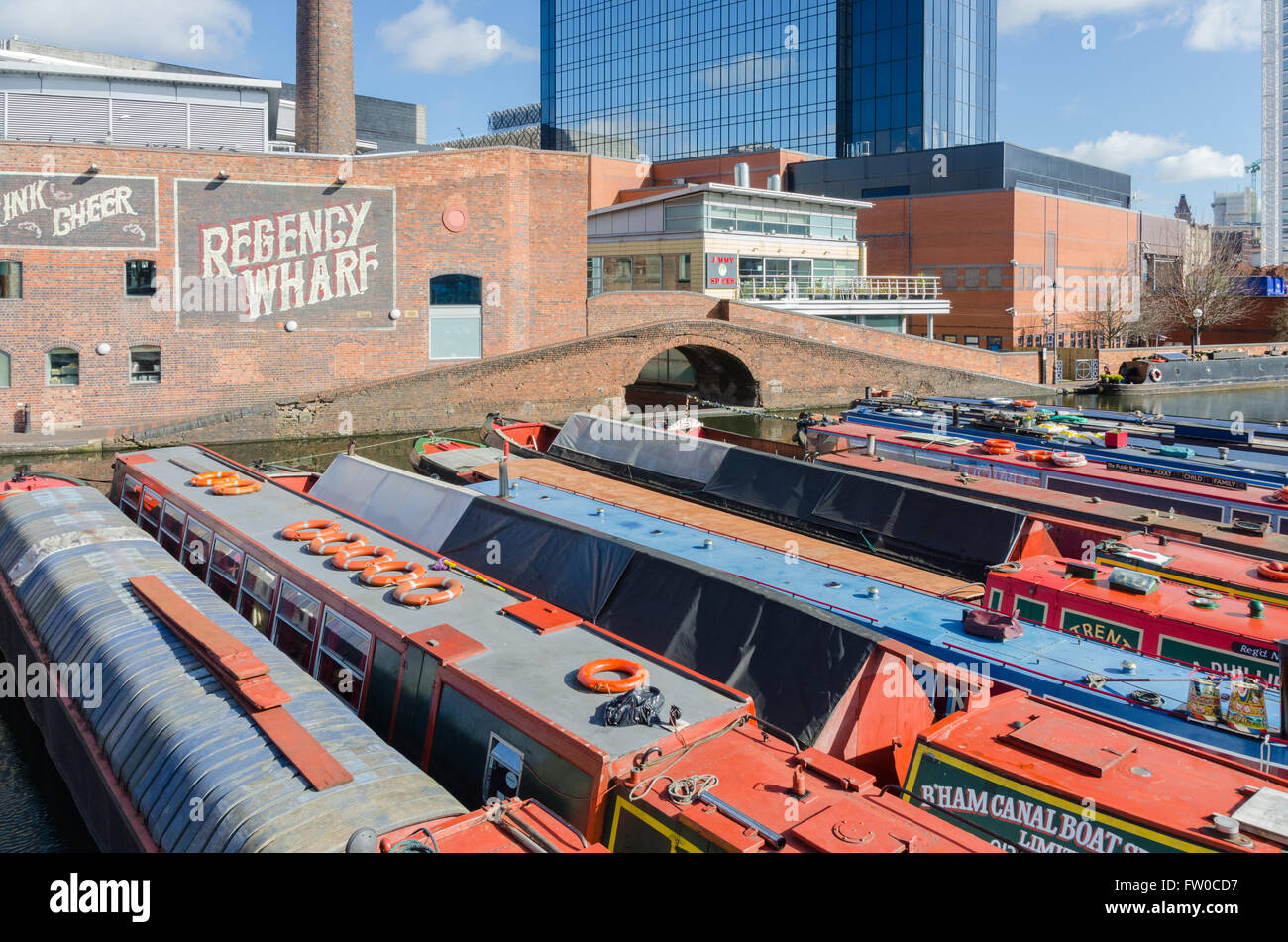 Narrowboats moored in Gas Street Basin in Birmingham City Centre Stock Photo