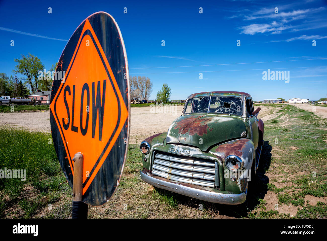 Classic 1948 GMC pickup truck abandoned in a field in Wyoming. Stock Photo