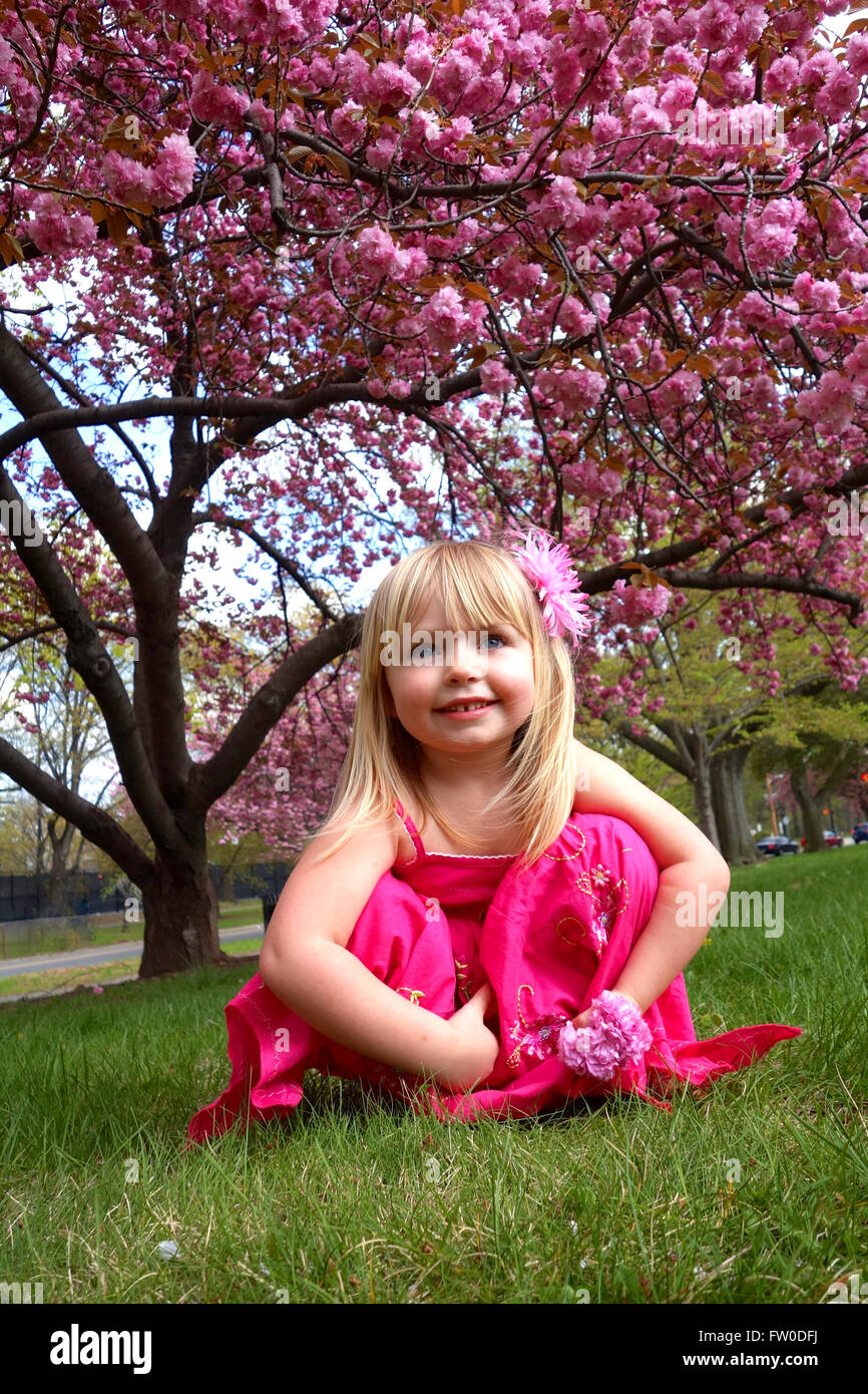 Girl and cherry blossom hi-res stock photography and images - Alamy