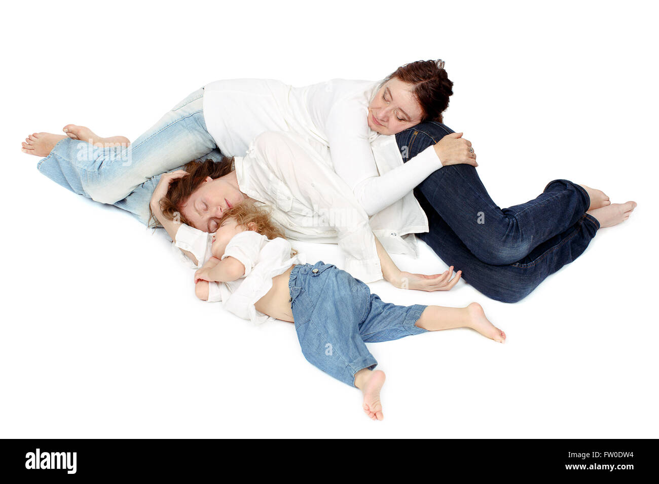 Three person of the family sleeping Stock Photo