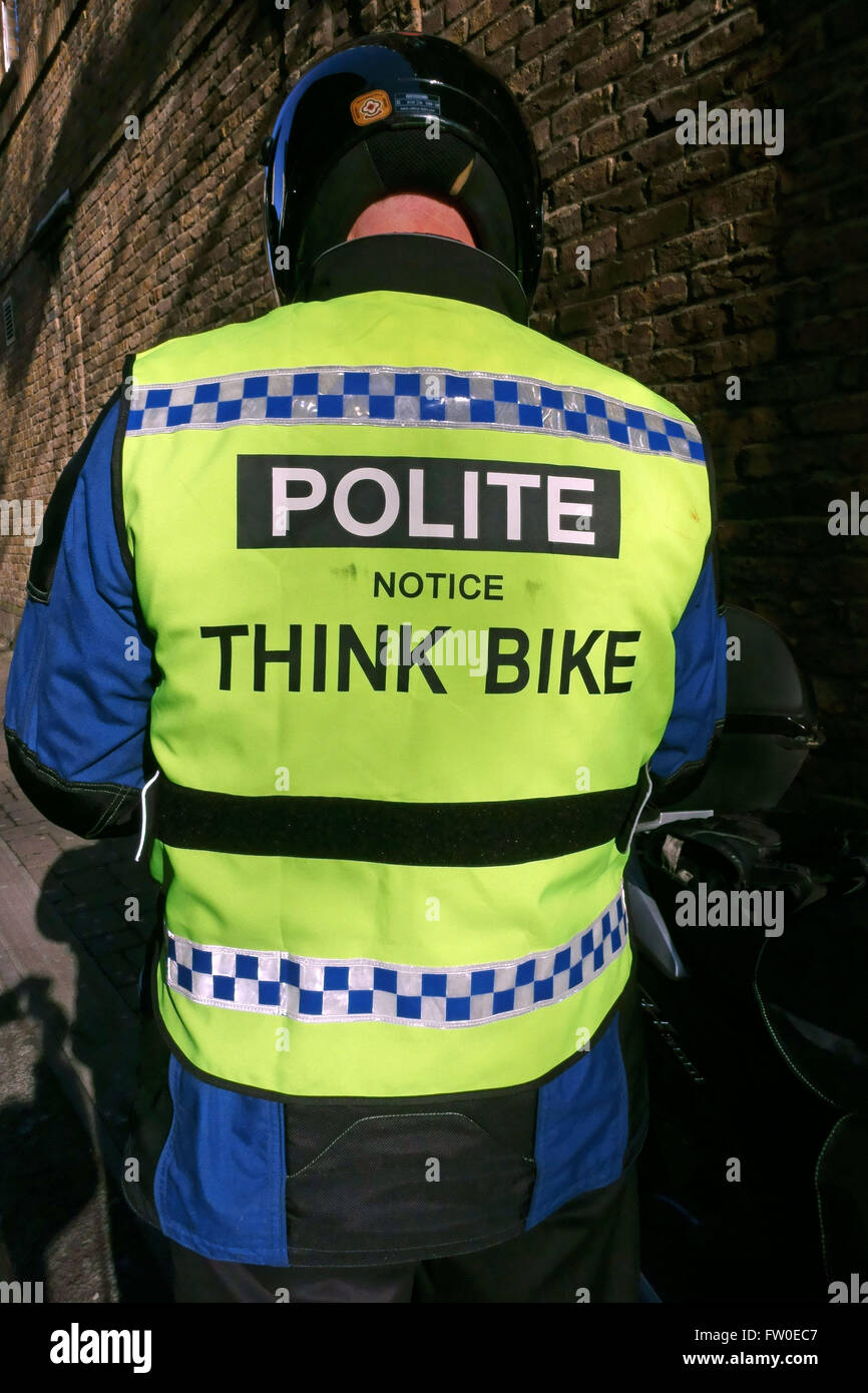 'Think Bike' message on motorcyclist's hi-vis jacket, London Stock Photo
