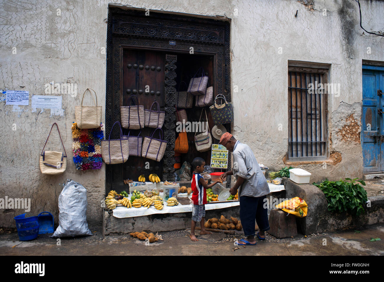 Sale of limes, bananas and different types of rice in the Stone Town central city. Stock Photo