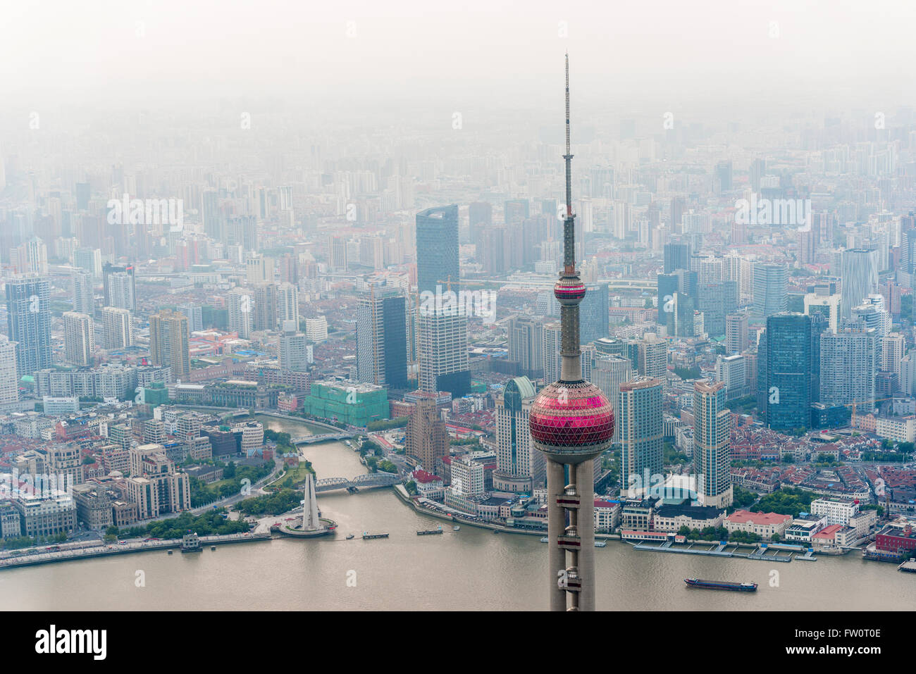 Shanghai aerial view at sunset with urban skyscrapers over river Stock Photo