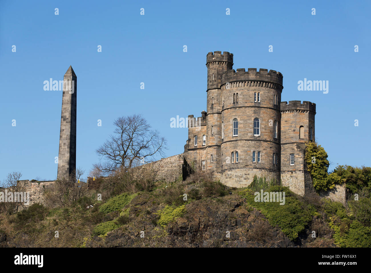 The obelisk known as the Martyr's Monument and Governor's House on Calton Hill in Edinburgh, Scotland. They stand in and next to Stock Photo