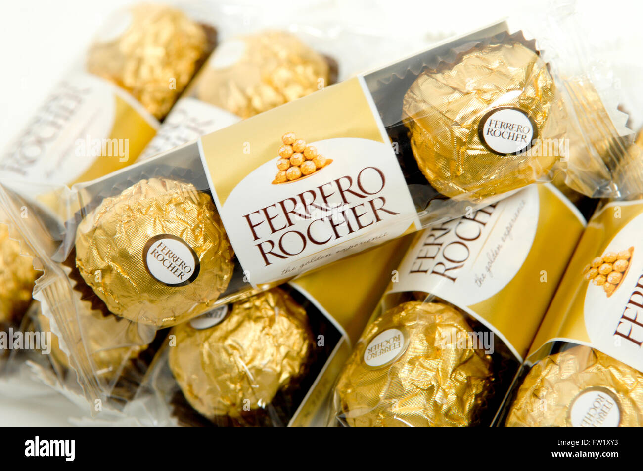 Ferrero Rocher is a premium, spherical chocolate sweet produced by the Italian chocolatier Ferrero SpA. Stock Photo