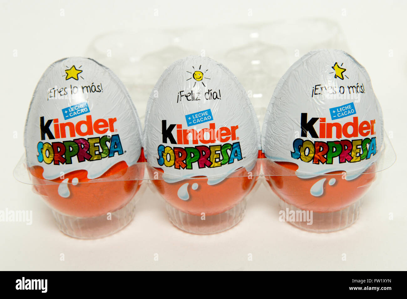 Kinder Surprise, also known as a Kinder Egg manufactured by Italian company Ferrero taken on white background. Stock Photo