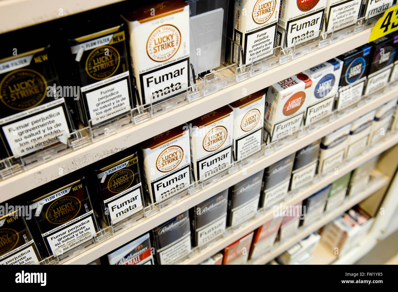 Selection of Lucky Strike Cigarettes on sale in a tobacconist. Stock Photo