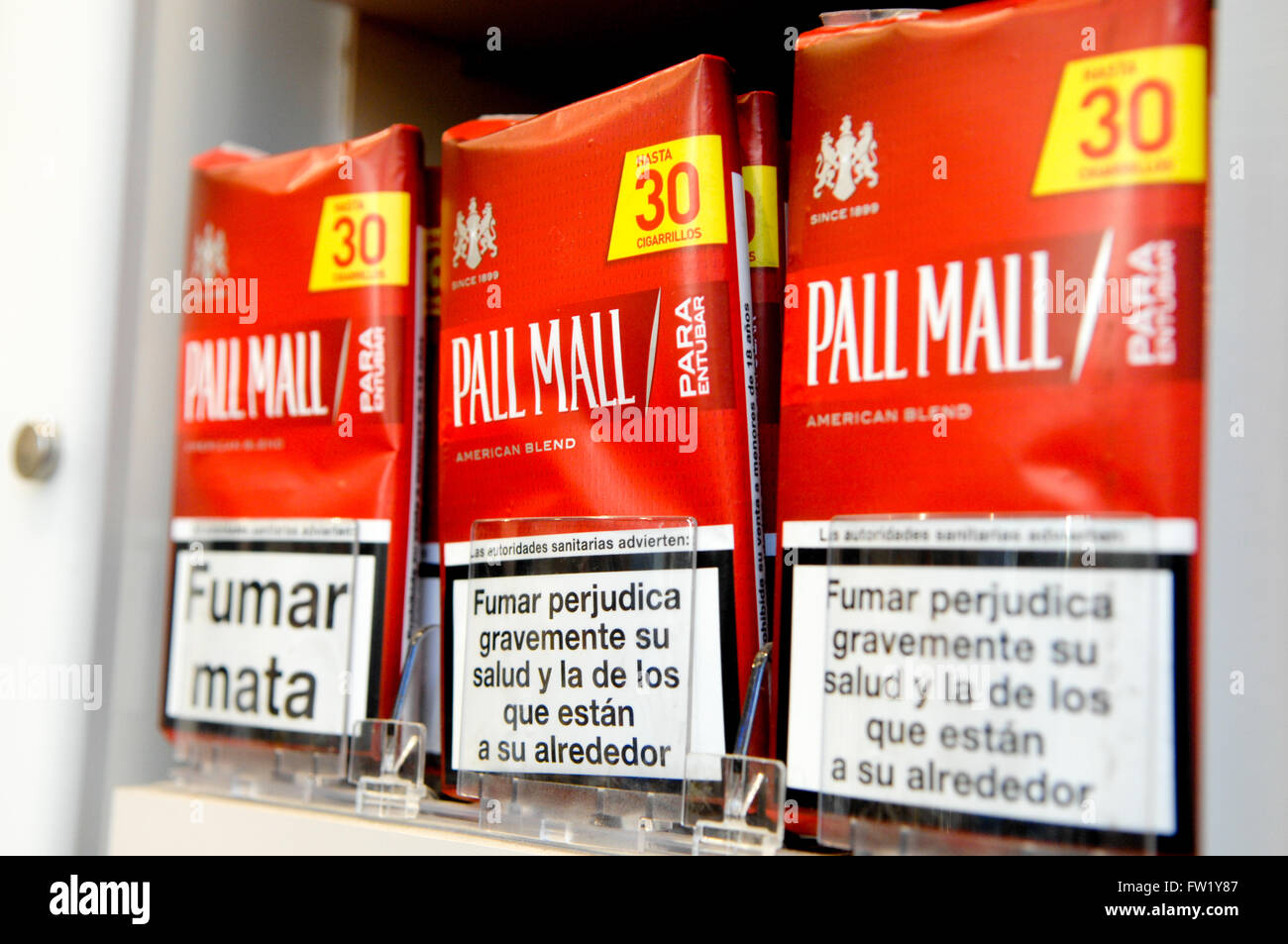 Pall Mall Cigarettes produced by British American Tobacco on sale in a tobacconist. Stock Photo