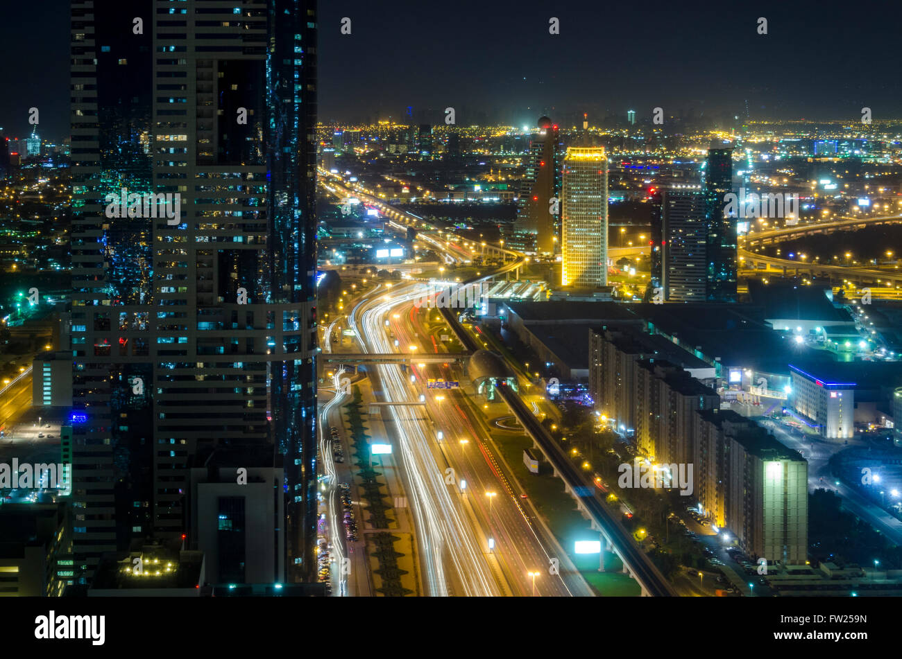 Dubai at night looking East along Sheikh Zayed Road from Emirates