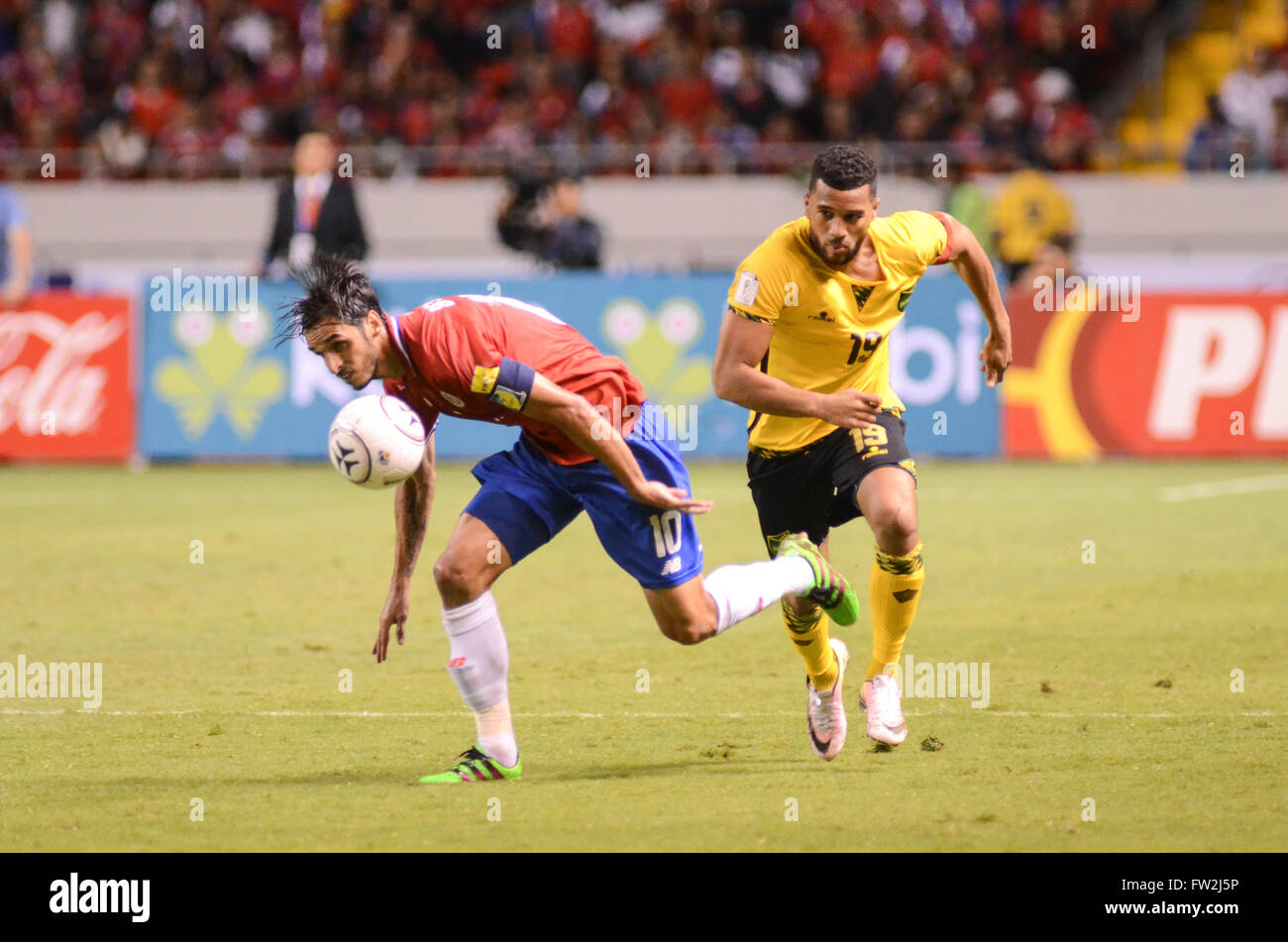 Bryan Ruiz (L) against Adrian Joseph Mariappa (R). FIFA World Cup™ Qualifiers.  The game between Costa Rica and Jamaica National Stock Photo