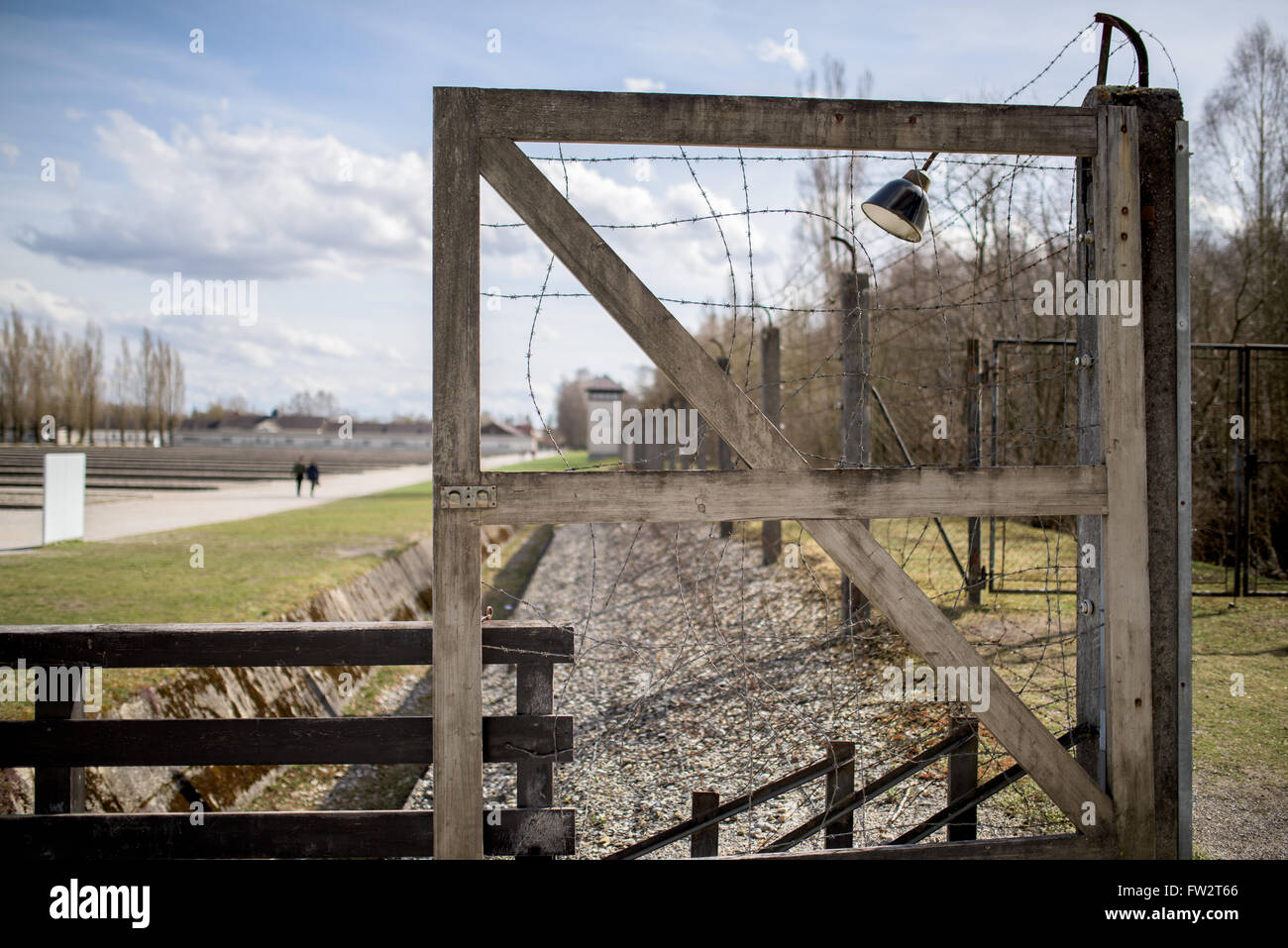 Fence around Dachau concentration camp Stock Photo