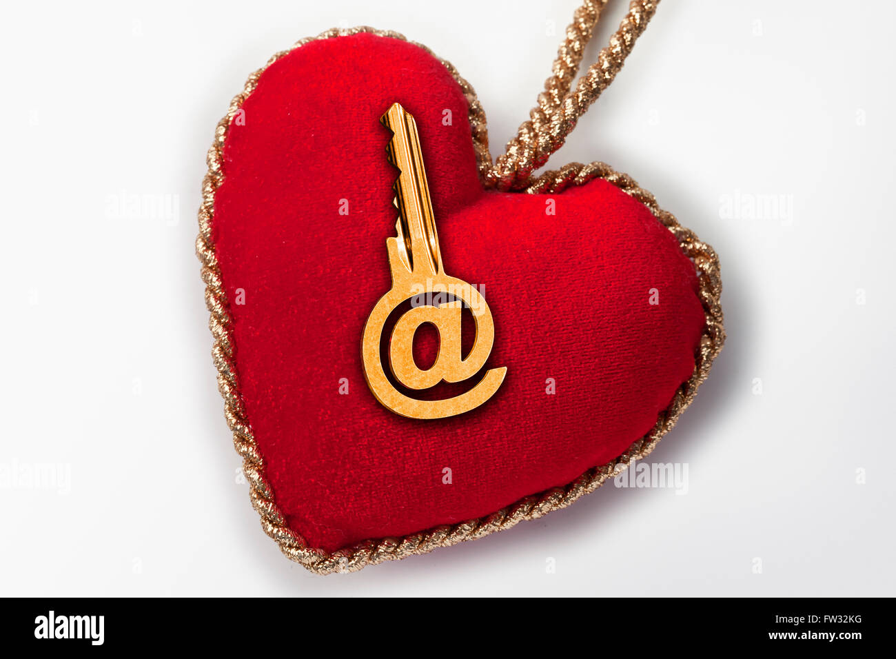 Red heart with an @ sign key Stock Photo