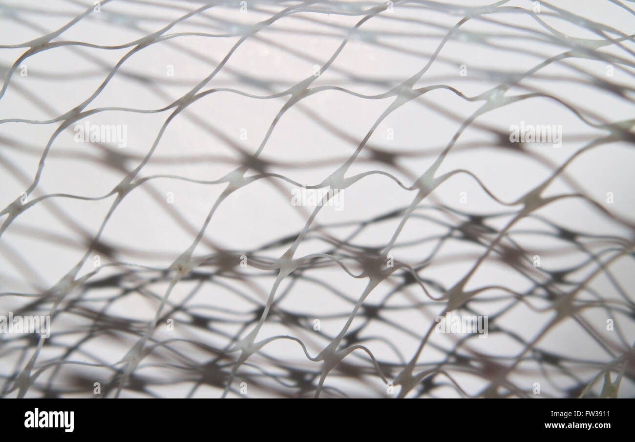 Closeup net and shadow on white background Stock Photo