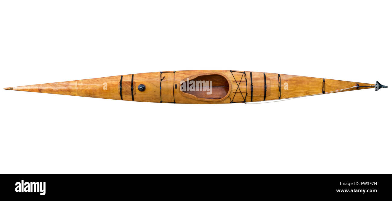 top view of a home built narrow and long wooden sea kayak isolated on white with a clipping path Stock Photo