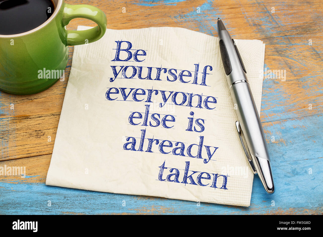 be yourself advice - handwriting on a napkin with cup[ of coffee Stock Photo