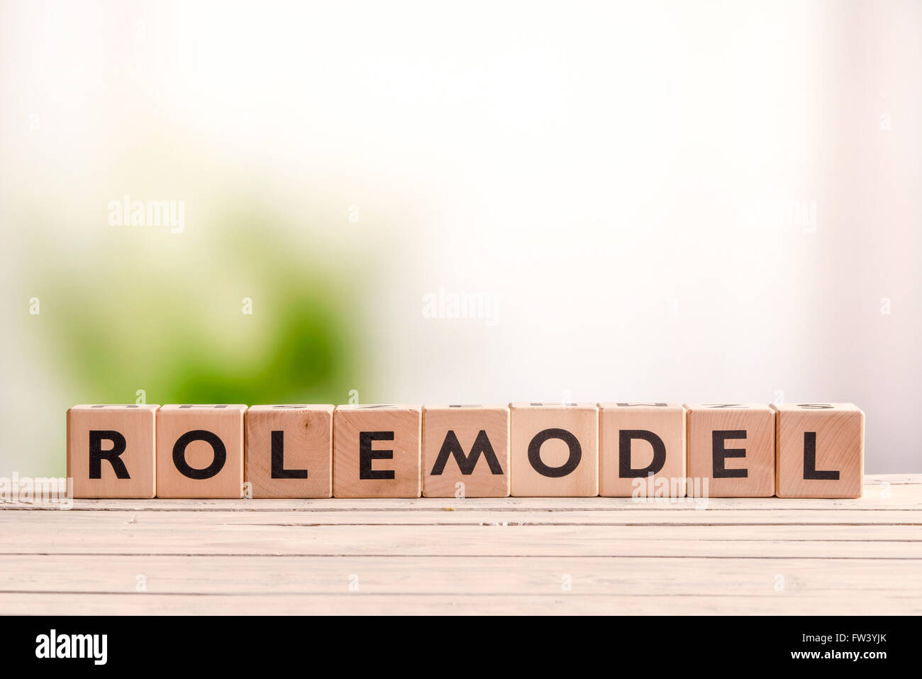 Rolemodel sign made with cubes on a table Stock Photo