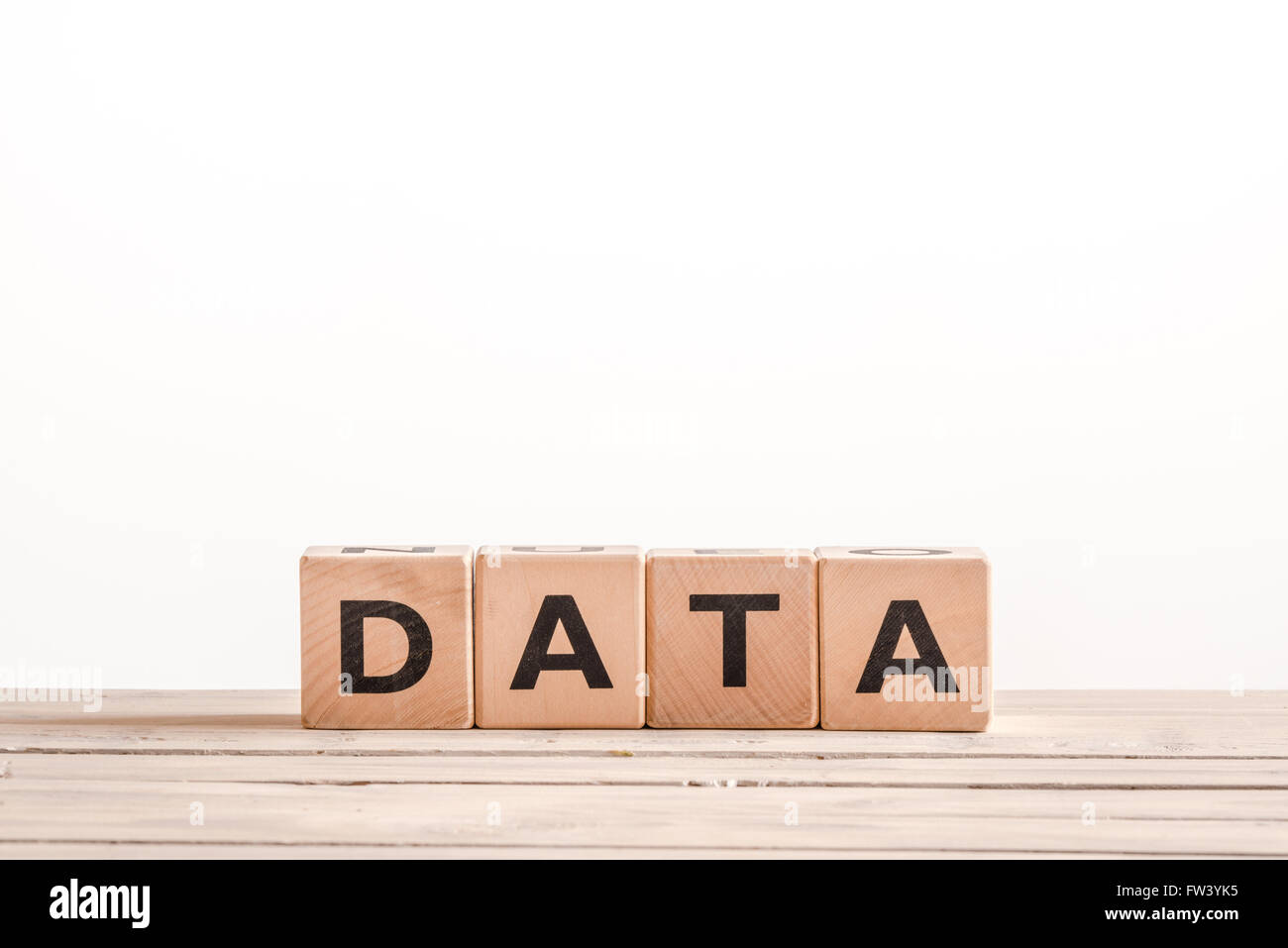 Data sign on a white background on a desk Stock Photo