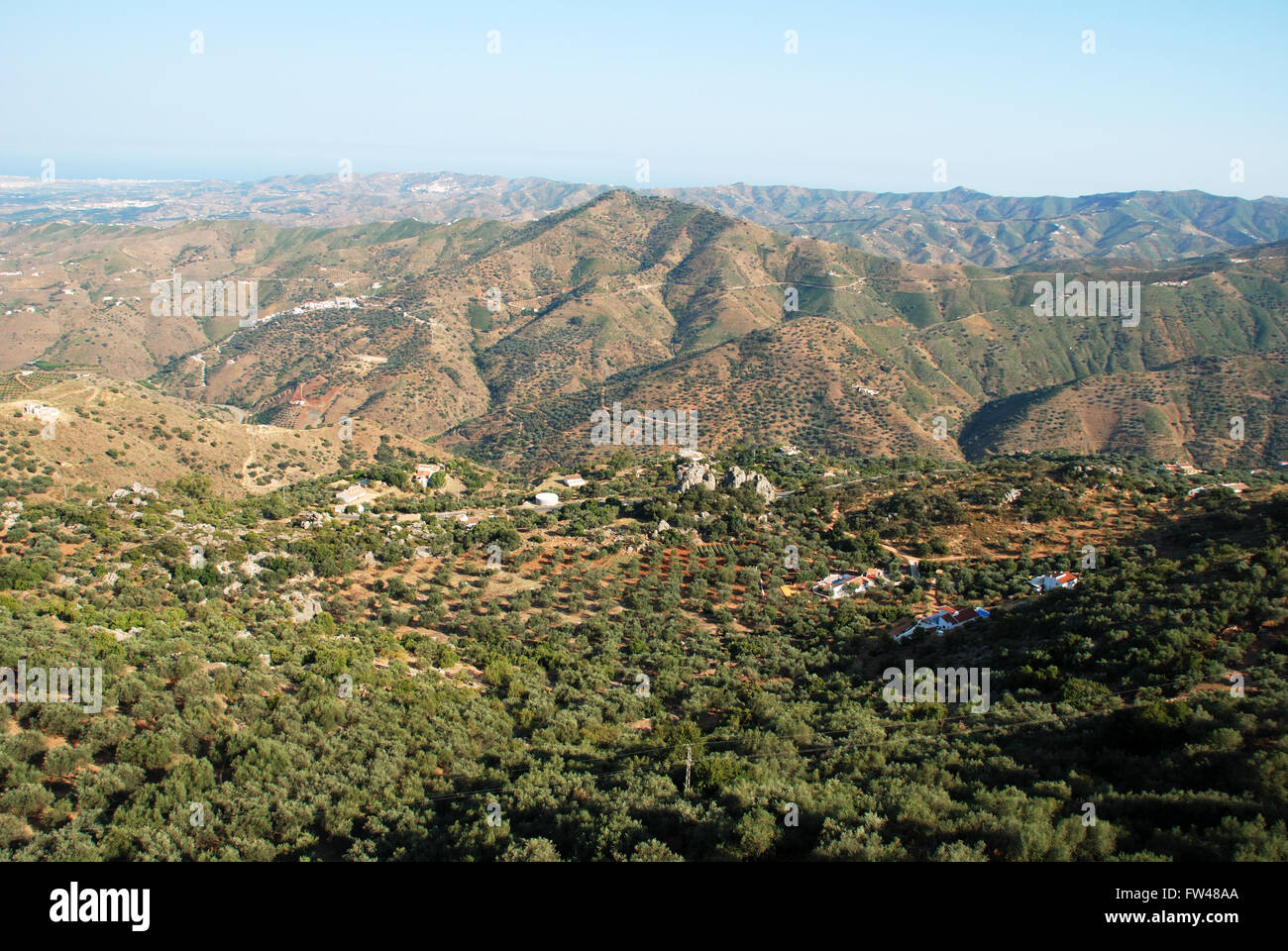 View over the Montanas de Malaga mountains towards the coast in the Axarquia region, Malaga Province, Andalusia, Spain. Stock Photo