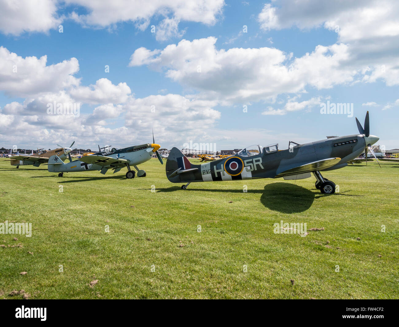 Spitfire PV202 H5R Mk.IXT and Hispano HA1112-M1L Buchon at the 2014 Shoreham Airshow. Stock Photo