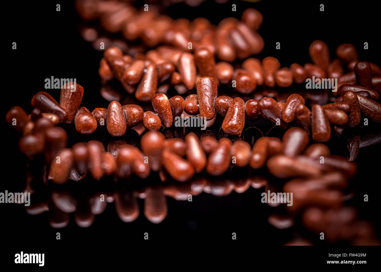 Sunstone necklace on black background Stock Photo