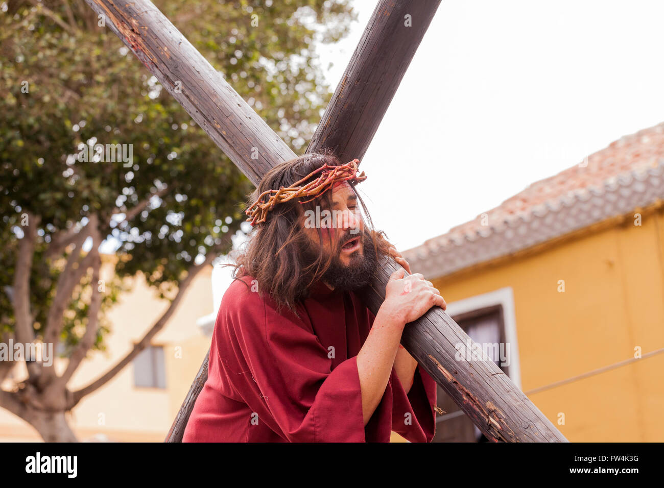 Jesus carrying the cross during the Passion play, Adeje, Tenerife, Canary Islands, Spain. Representacion de la Pasion. Adeje. 25 Stock Photo