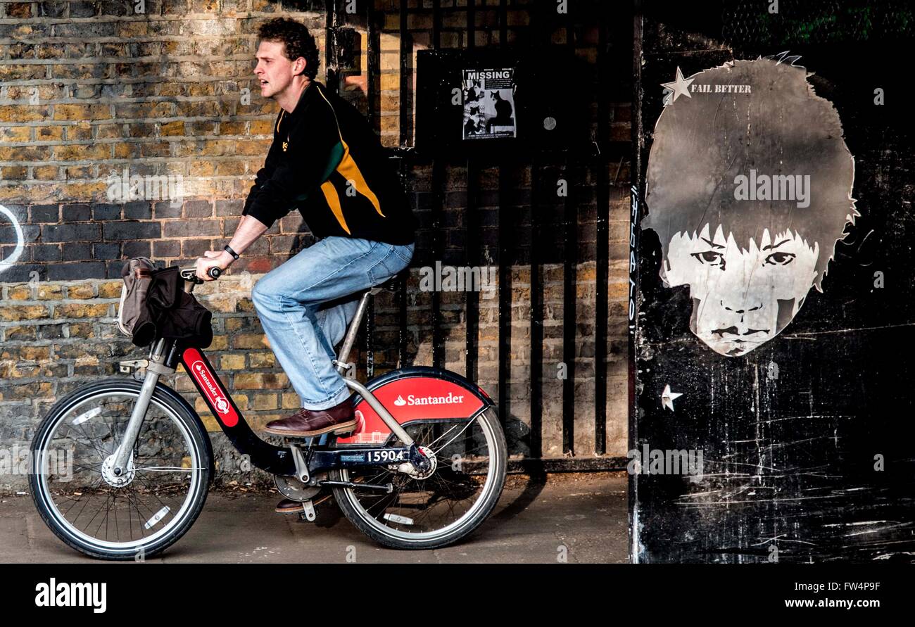 Santander Boris bike graffiti tow path ride Stock Photo