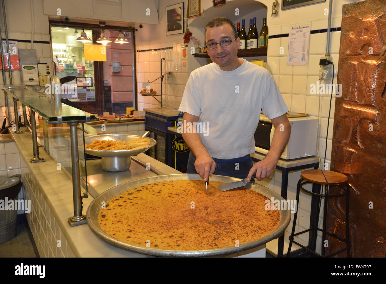 Sciamadda, typical restaurant, Farinata preparation, Genoa, Ligury, Italy, Europe Stock Photo