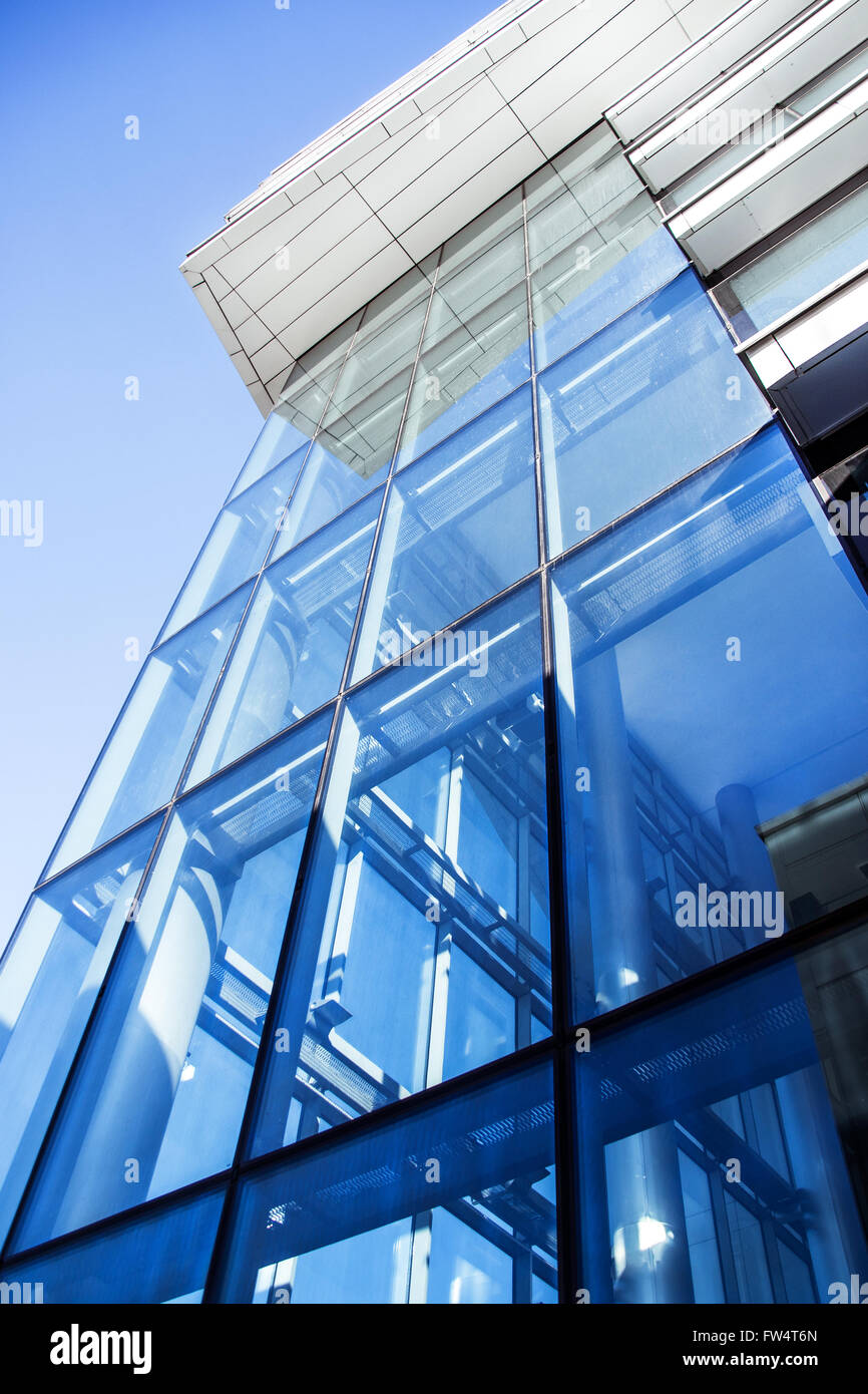 Modern building blue glass wall Stock Photo - Alamy