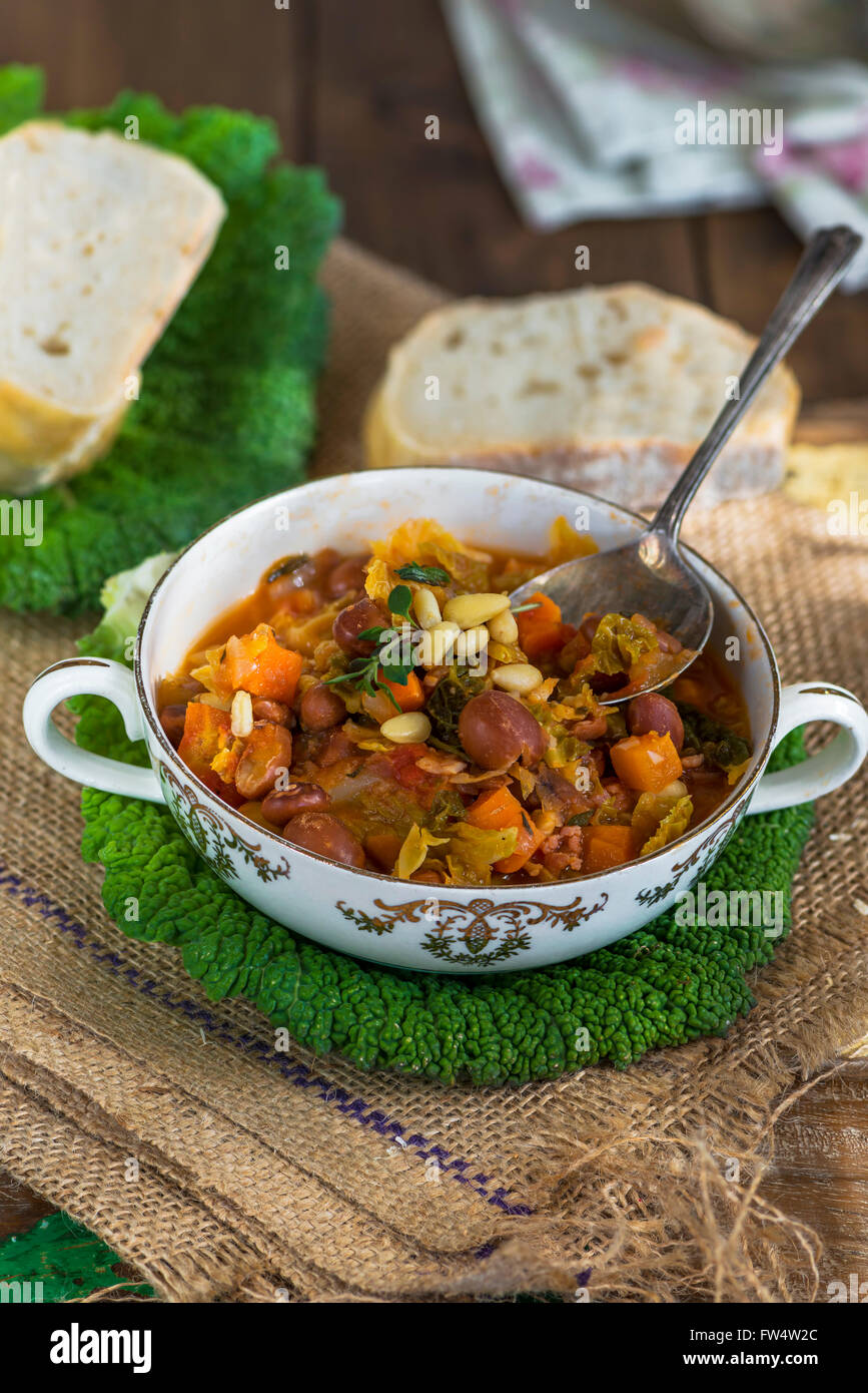 Savoy cabbage stew with carrot and borlotti beans Stock Photo Alamy
