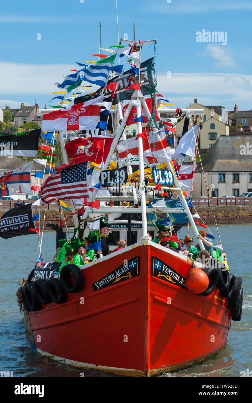 PL39 Venture Again parading in Maryport harbour before the race, Maryport, Cumbria Stock Photo