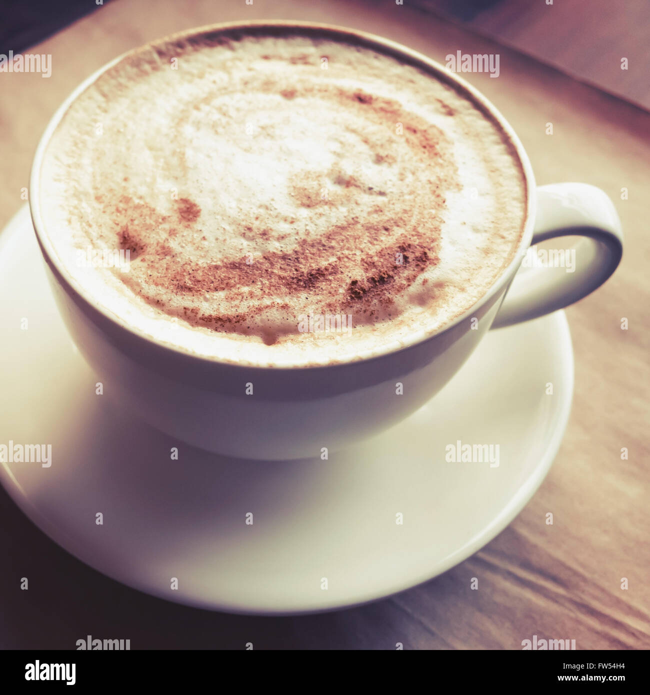 Big cup of cappuccino. Coffee with milk foam in white mug. Vintage tonal  correction photo filter, old style effect Stock Photo - Alamy