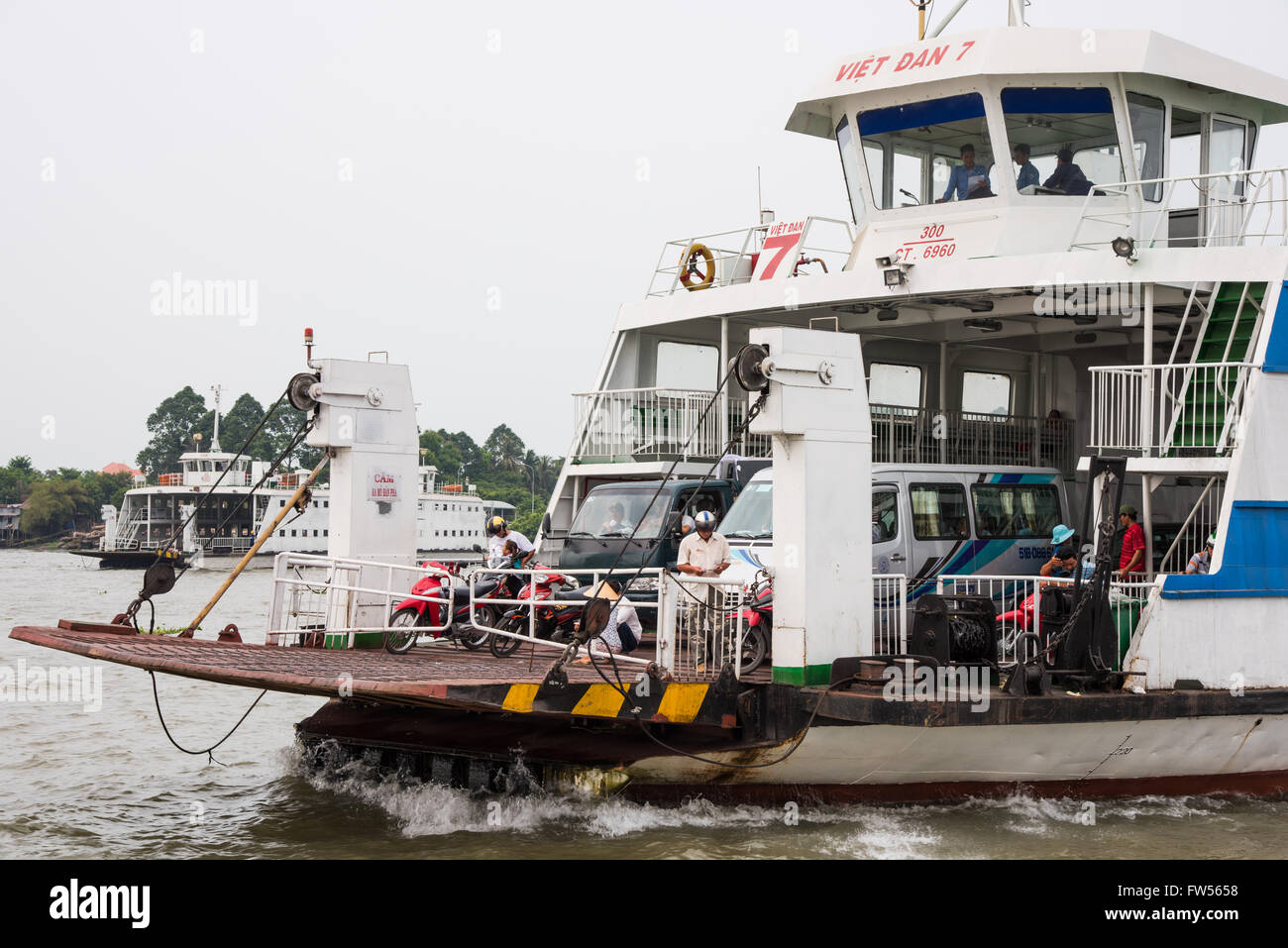 VietDan river ferries crossing the Mekong River at An Hoa near Long
