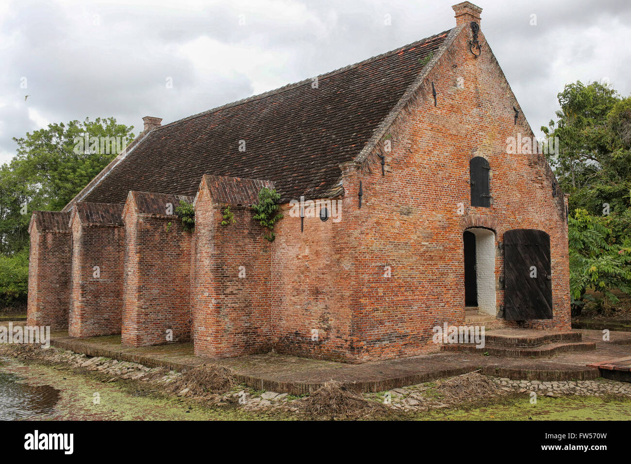 Old munition depot at the renovated plantation in Frederiksdorp, Suriname Stock Photo