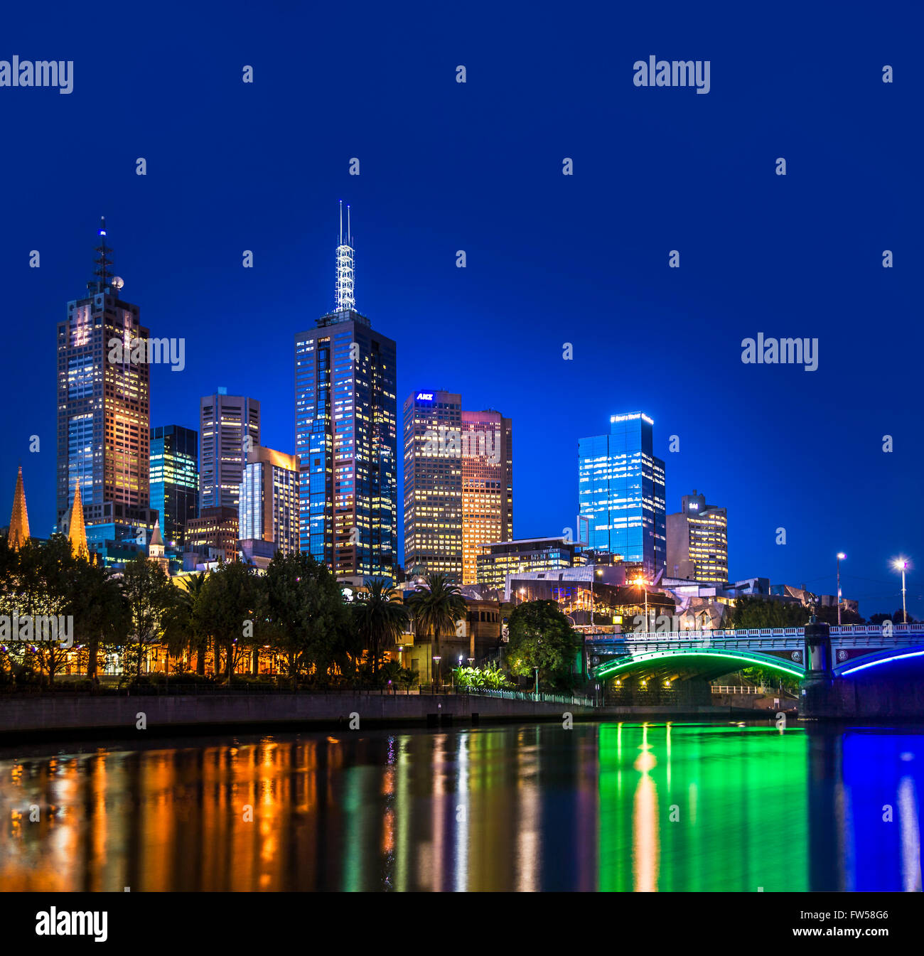 Illuminated city skyline at night of Melbourne CBD. A view from Yarra River on the southbank side of the city, looking up toward Princes Bridge Stock Photo