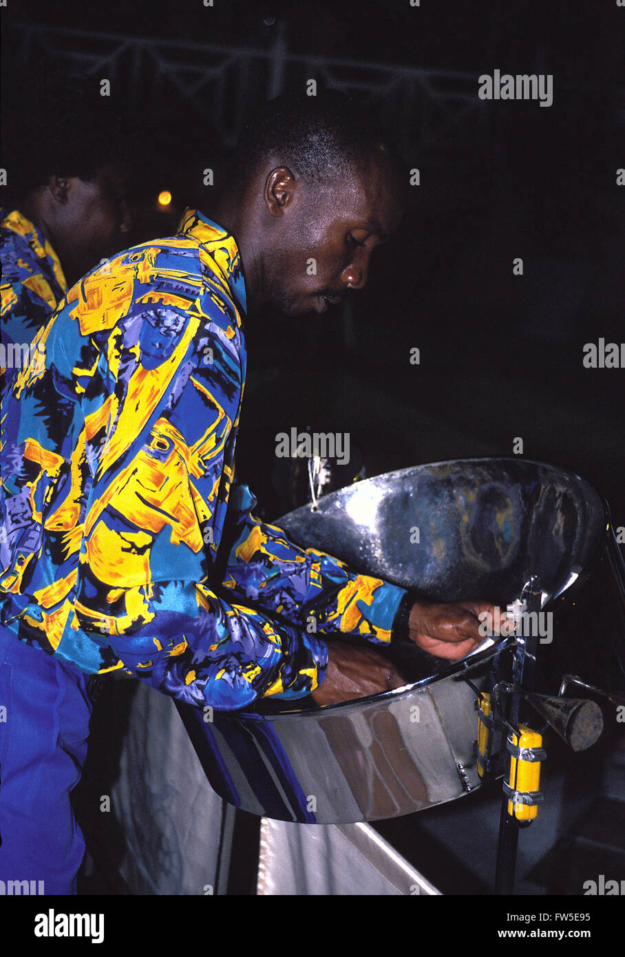 INSTRUMENTSPERCUSSIONDRUMSSTEEL DRUMS Player in Steel 'Pan' Band