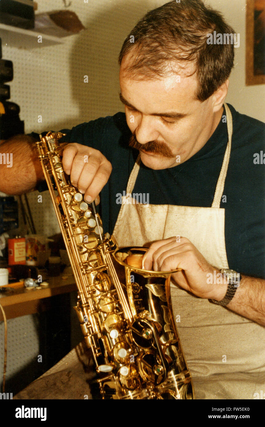 SAXOPHONE instrument maker Trevor Maloney (maker) repairing saxophone