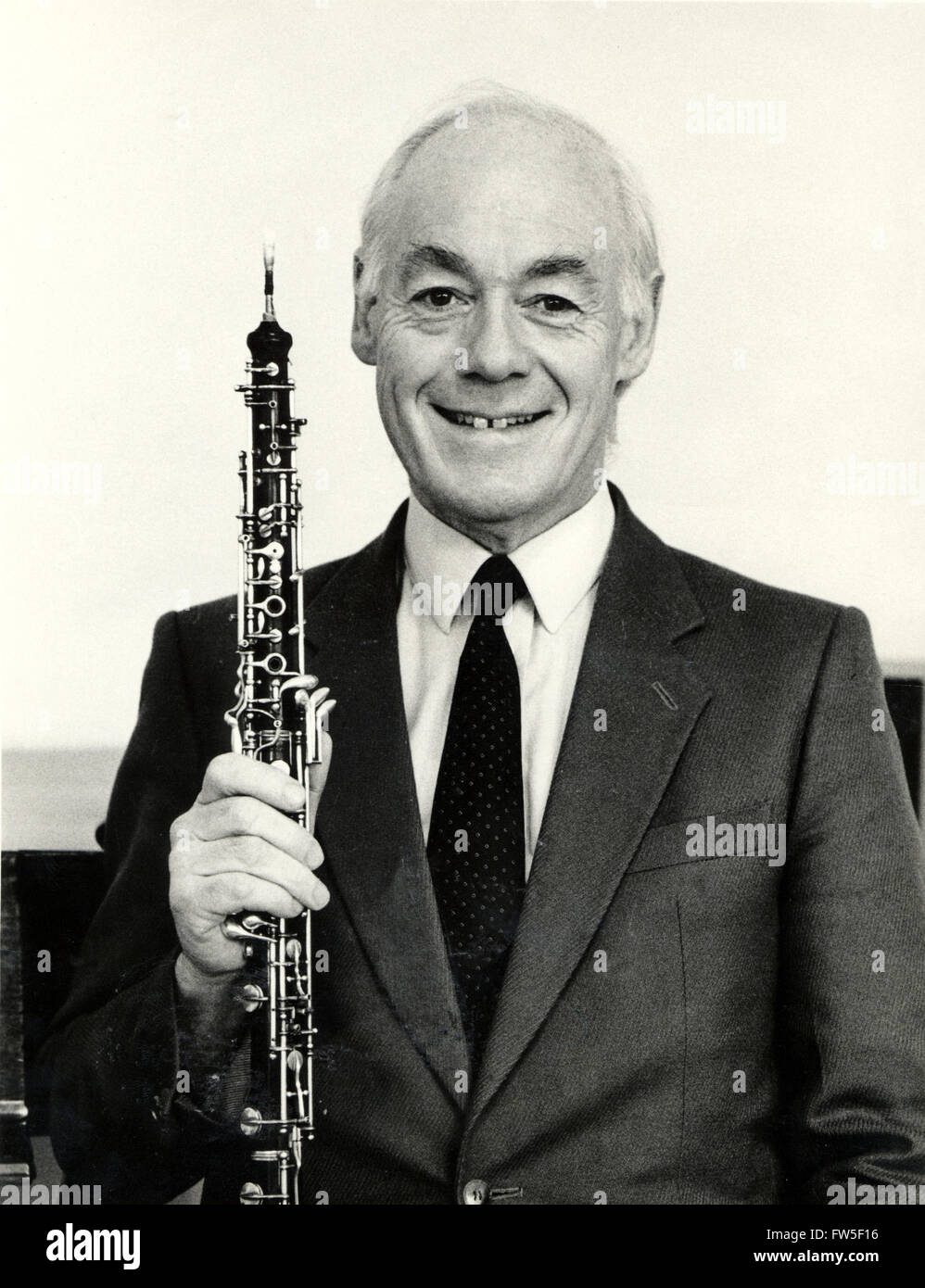 Neil Black, OBE, with oboe. Exprincipal oboist of the English Chamber