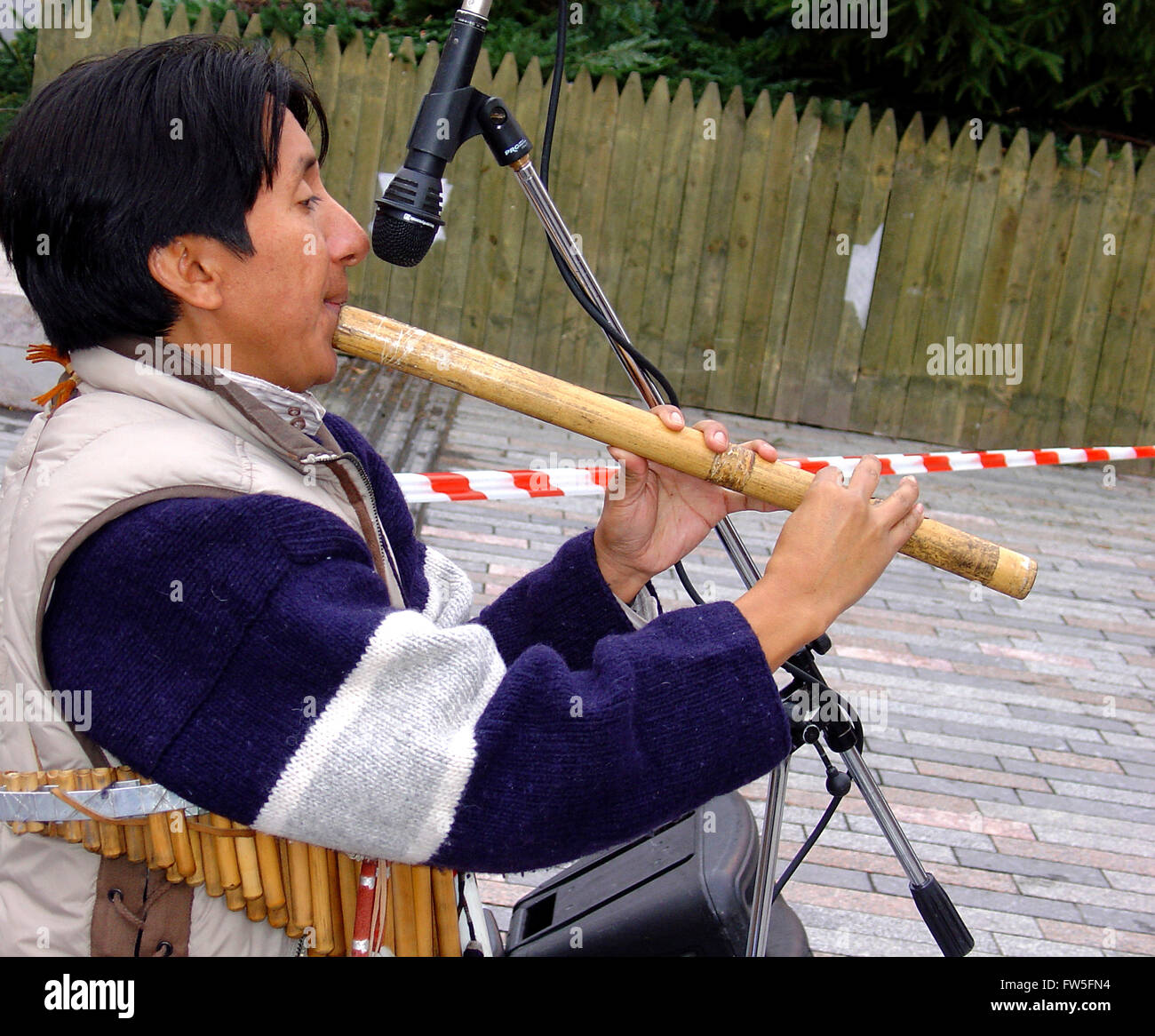 Quenocho tenor Bolivian fipple flute played by busker Stock