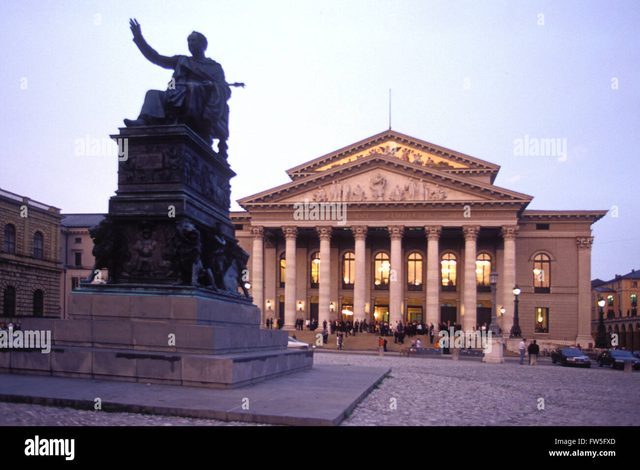 Bayerische Staatsoper (Bavarian State Opera) - exterior view of the National Theatre at dusk on Max-Joseph-Platz, Munich, Stock Photo