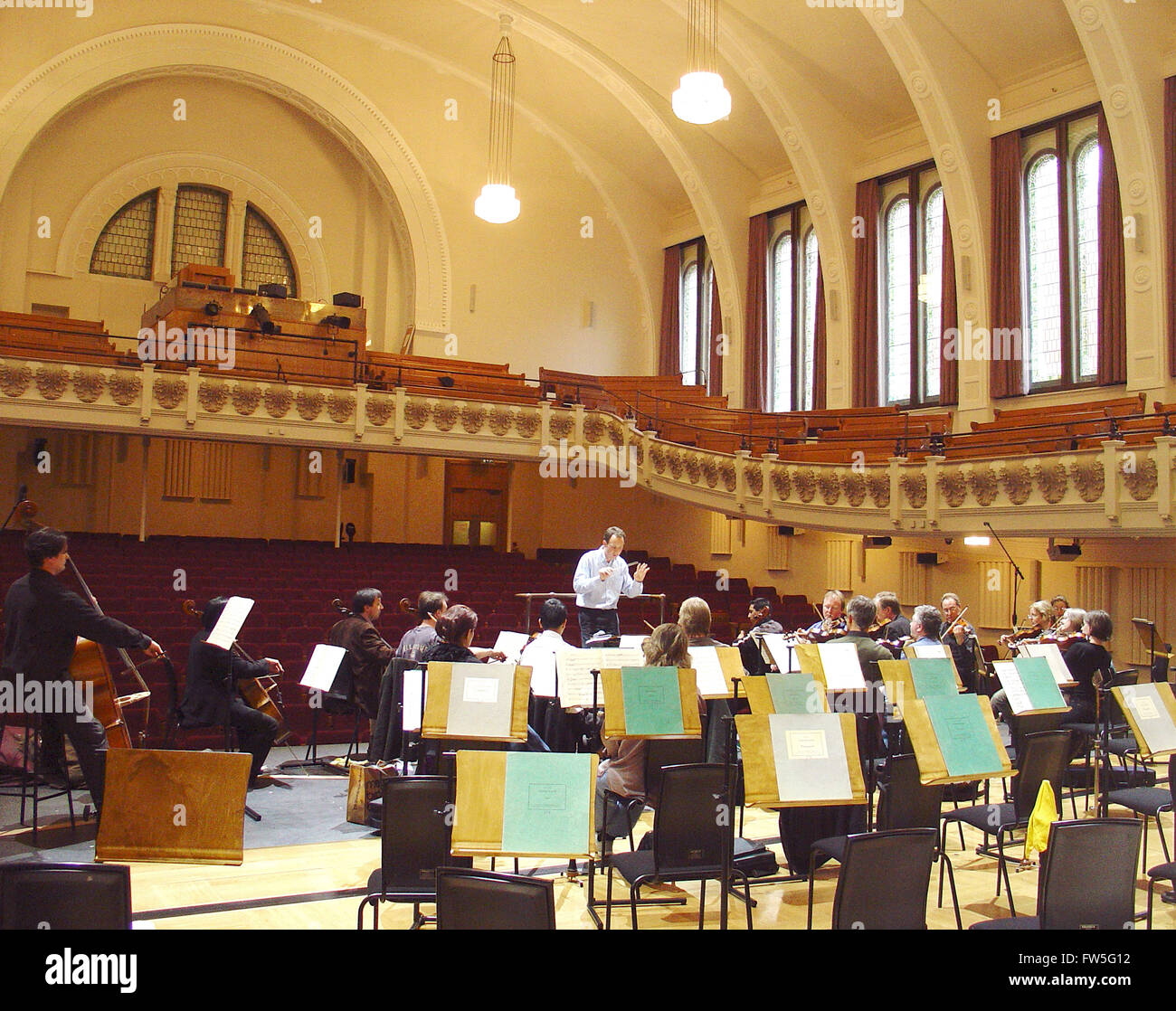 Cadogan Hall - an orchestra rehearsing in the concert hall auditorium, Sloane Square, London. Home of the Royal Philharmonic Stock Photo
